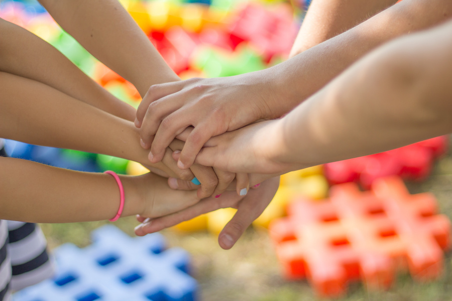 Team Putting Hands Together